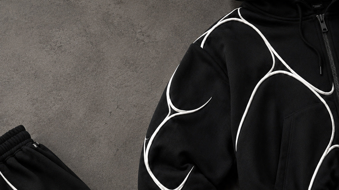 Maison Vynce Pulse Set — construction noire et piping blanc en détail