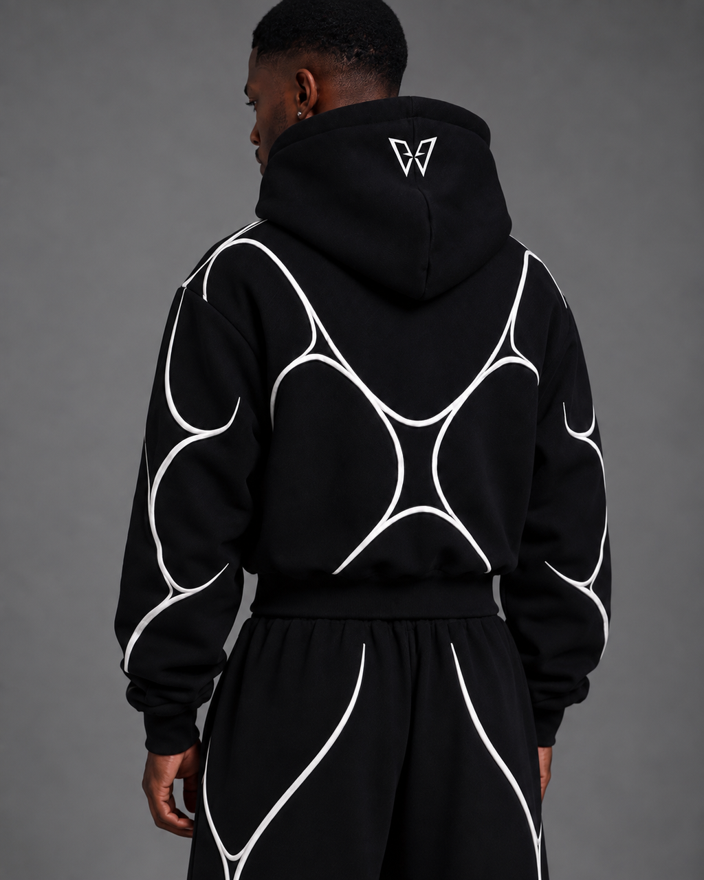 Pulse Hoodie V1.1 close-up of the back hood logo and white textile piping.