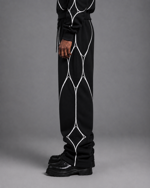 Pulse Wide-Leg Pants V1.1 front studio view showing the long wide-leg silhouette and white textile piping.
