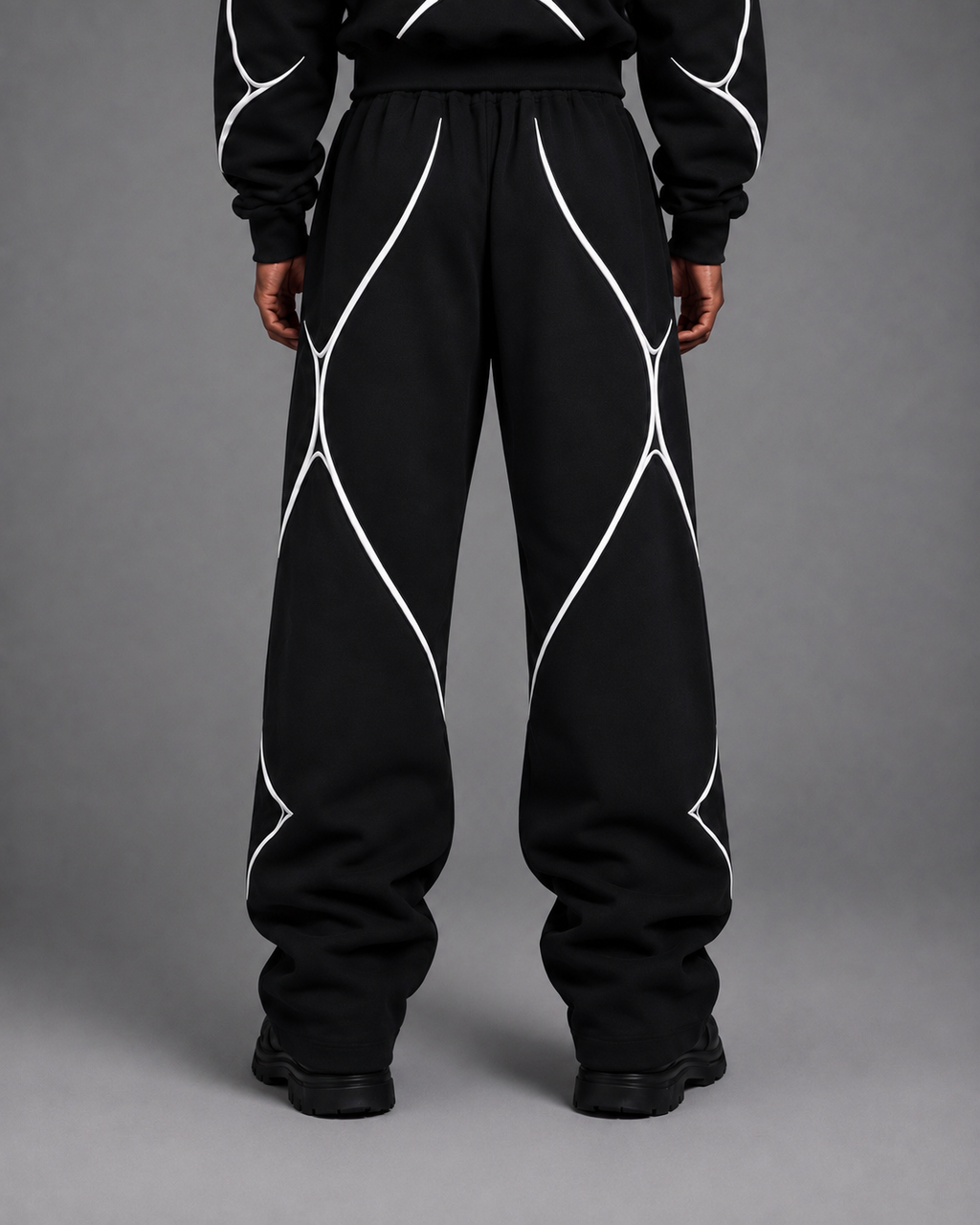 Pulse Wide-Leg Pants V1.1 back studio view showing the rear silhouette and piping.