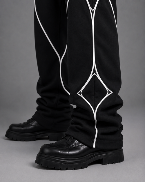 Pulse Wide-Leg Pants V1.1 side studio view showing the leg volume and piping geometry.