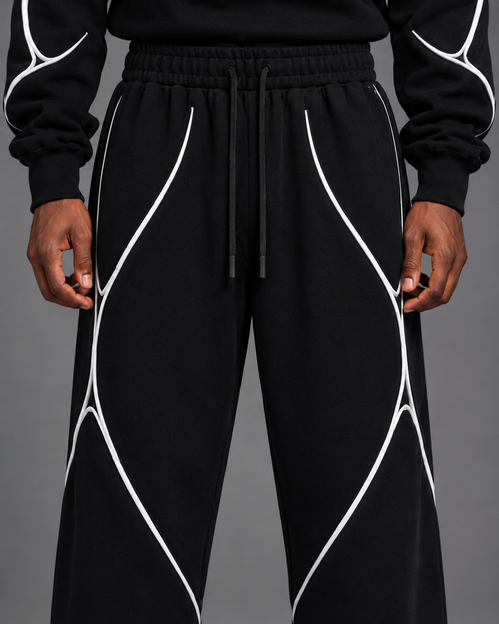 Pulse Wide-Leg Pants V1.1 close-up of the lower leg, stacking and white piping detail.