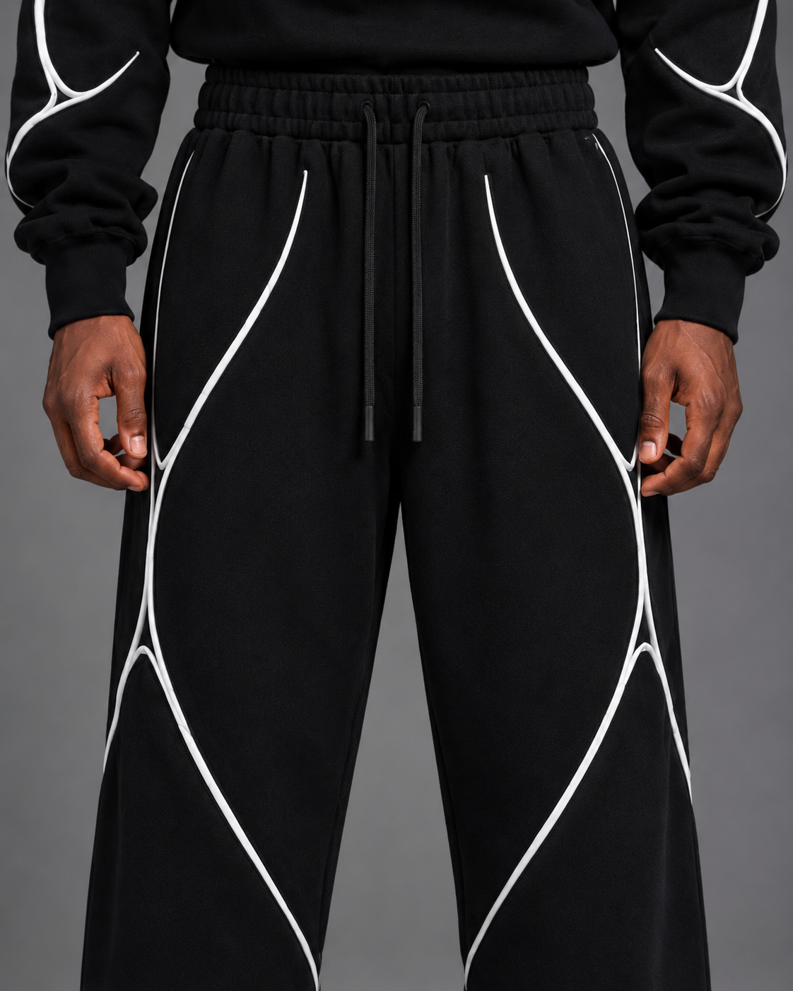Pulse Wide-Leg Pants V1.1 close-up of the lower leg, stacking and white piping detail.